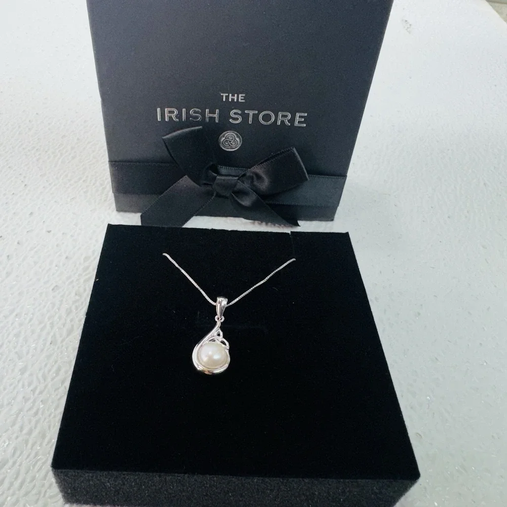 The Irish Store Sterling Silver and Half Pearl Trinity Knot Pendant with Chain